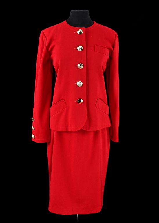 A 1991s red two-piece costume consisting of jacket and skirt  by Yves Saint Laurent.