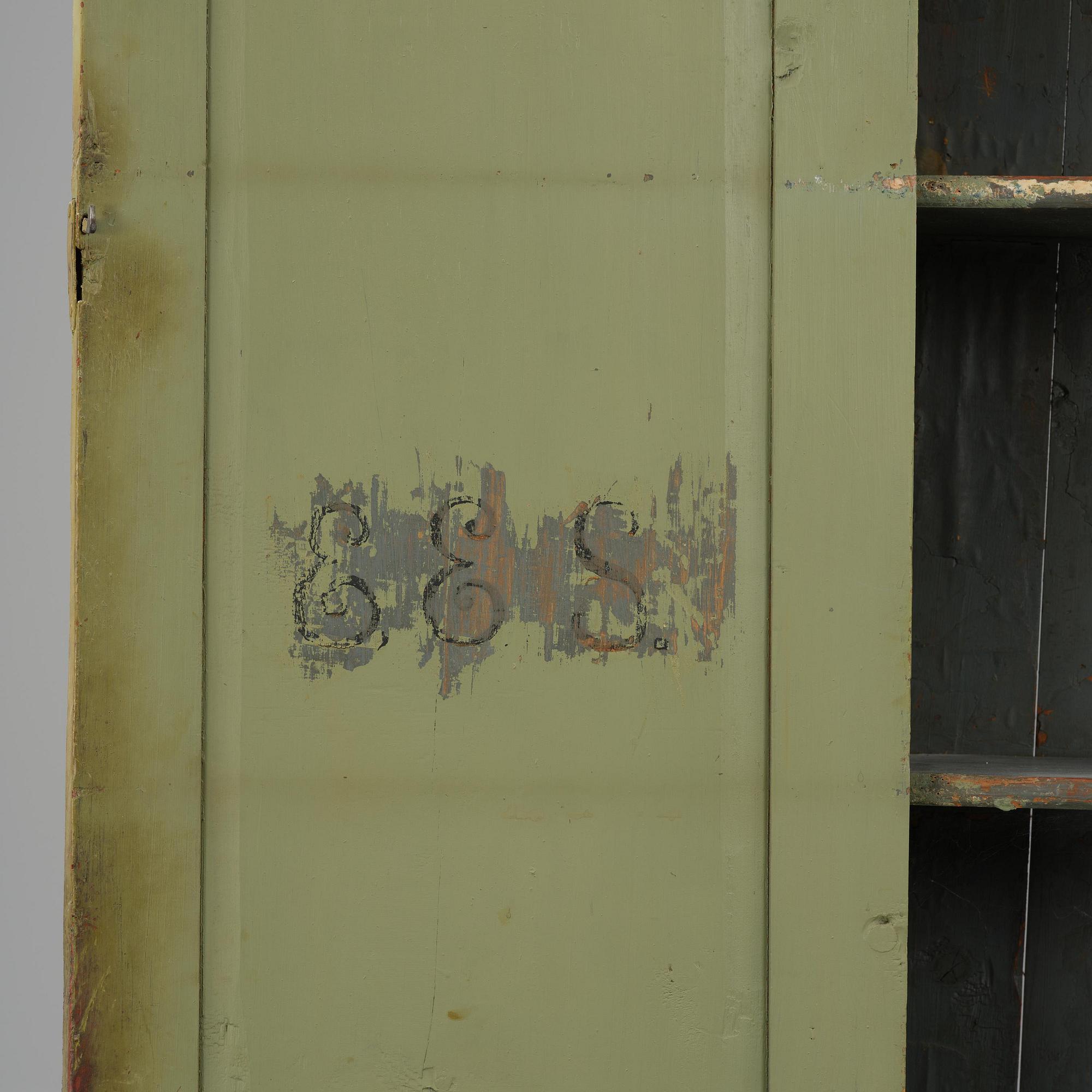 A Swedish polychrome-painted rococo cabinet, late 18th century.