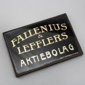 AFFÄRSSKYLT, glas och metall, 1900-talets första hälft.