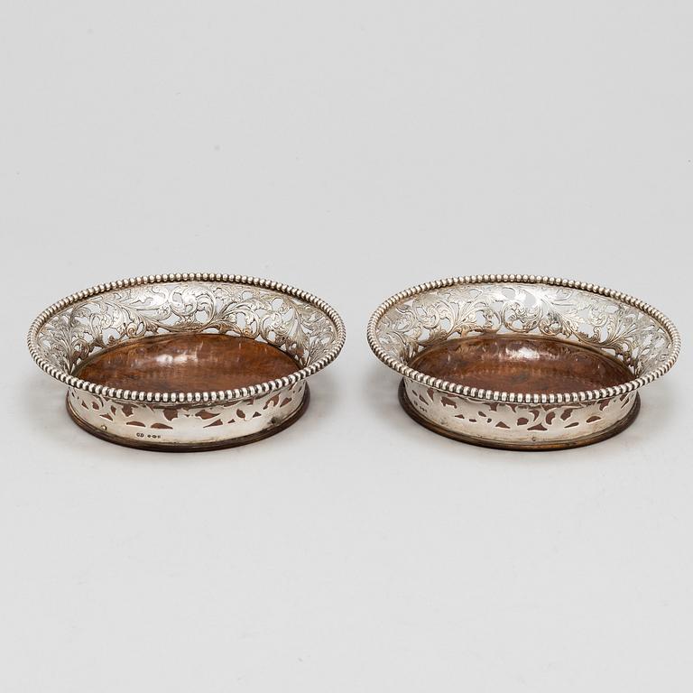 A pair of sterling silver coasters, late 20th Centrury.