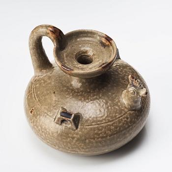 A olive green glazed wine jar, probably Jin/Six dynasties (265-420).