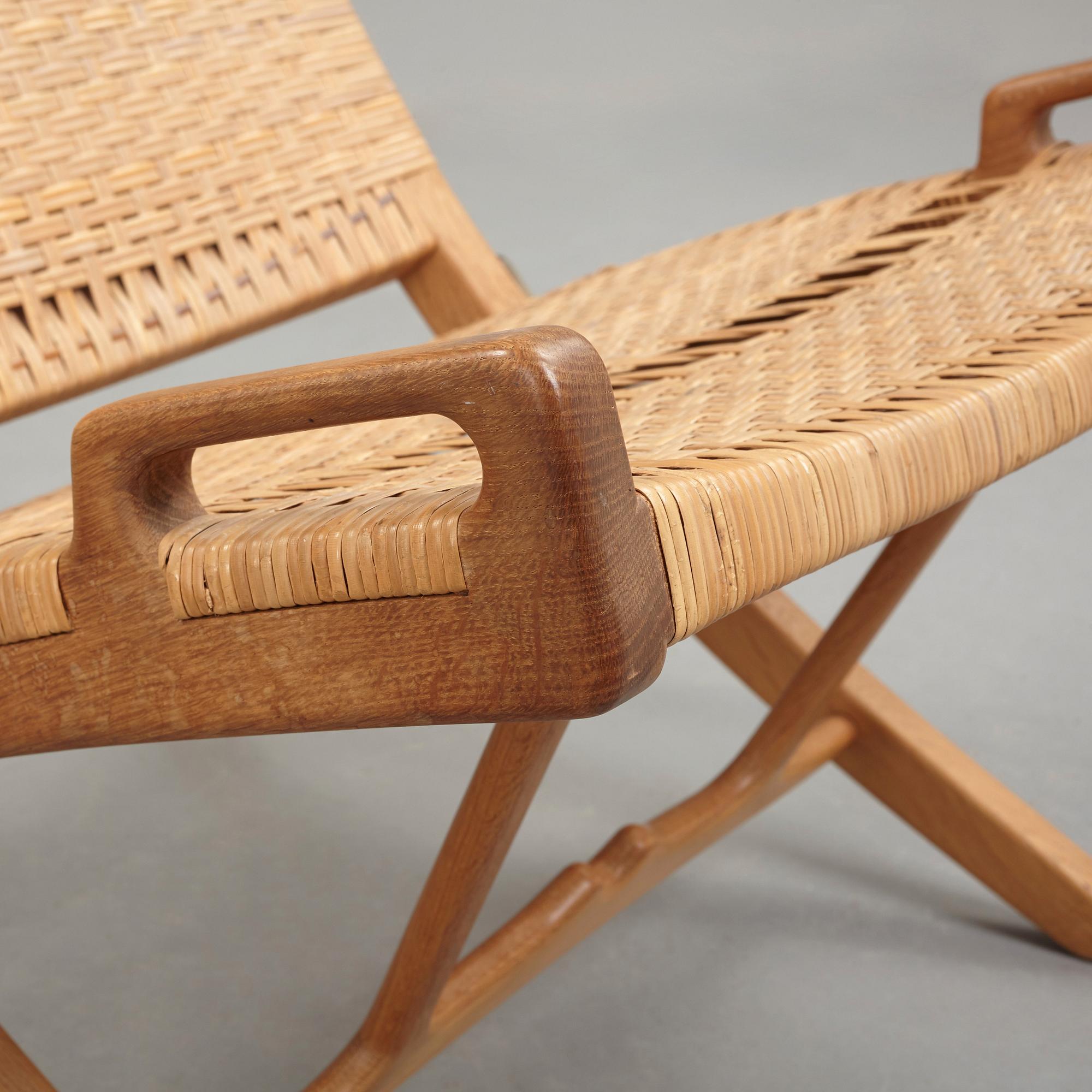 Hans J. Wegner, A pair of Hans J Wegner model 512 oak 'Folding Chairs' executed by Johannes Hansen, Denmark 1950's.