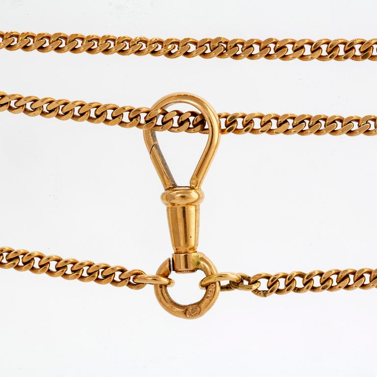 An 18K gold watch chain.