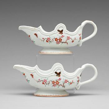 709. A pair of famille rose sauce boats, Qing dynasty, Qianlong (1736-95).
