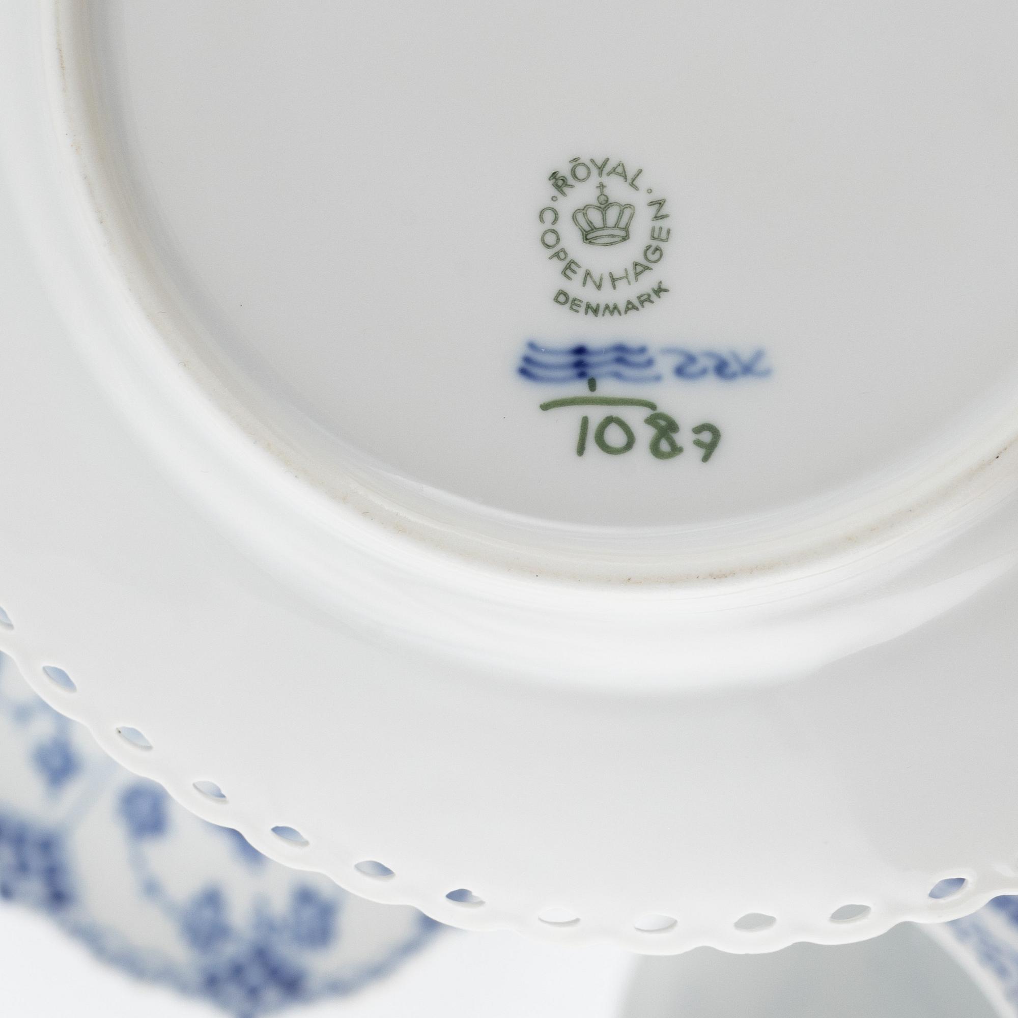 A 35-piece porcelain coffee service, "Musselmalet", mostly full lace, Royal Copenhagen, Denmark.