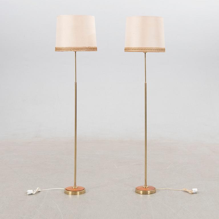 Floor lamps, a pair, mid-20th century.