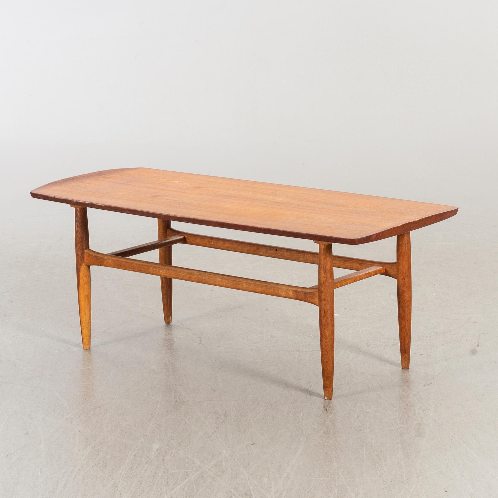 A mid 20th century Danish Jason lounge table.