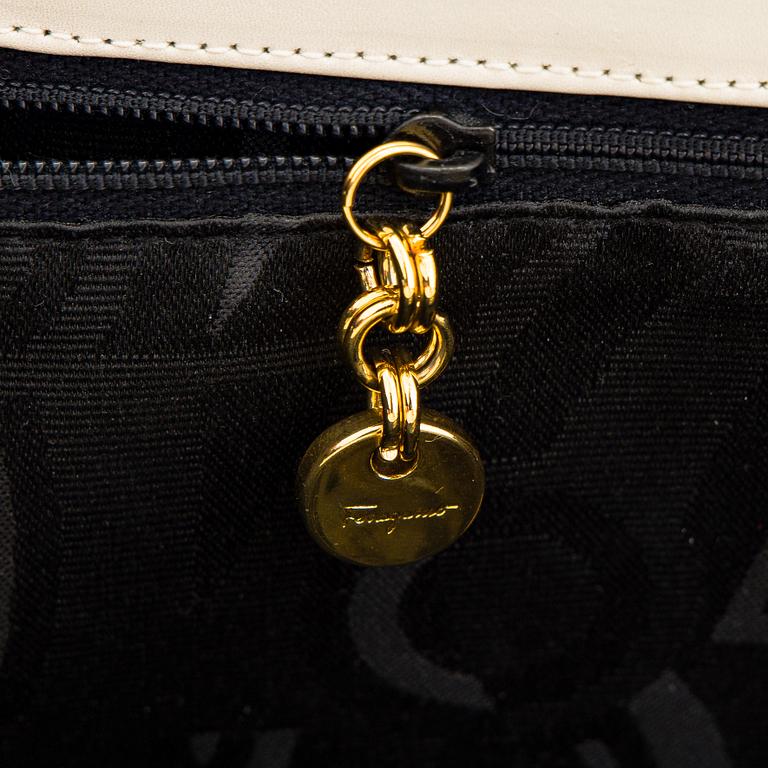 Salvatore Ferragamo, a leather “Gancini”bag.