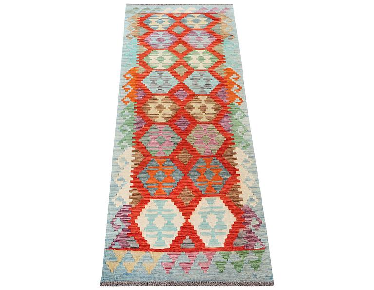 A runner carpet, Kilim, c. 287 x 79 cm.