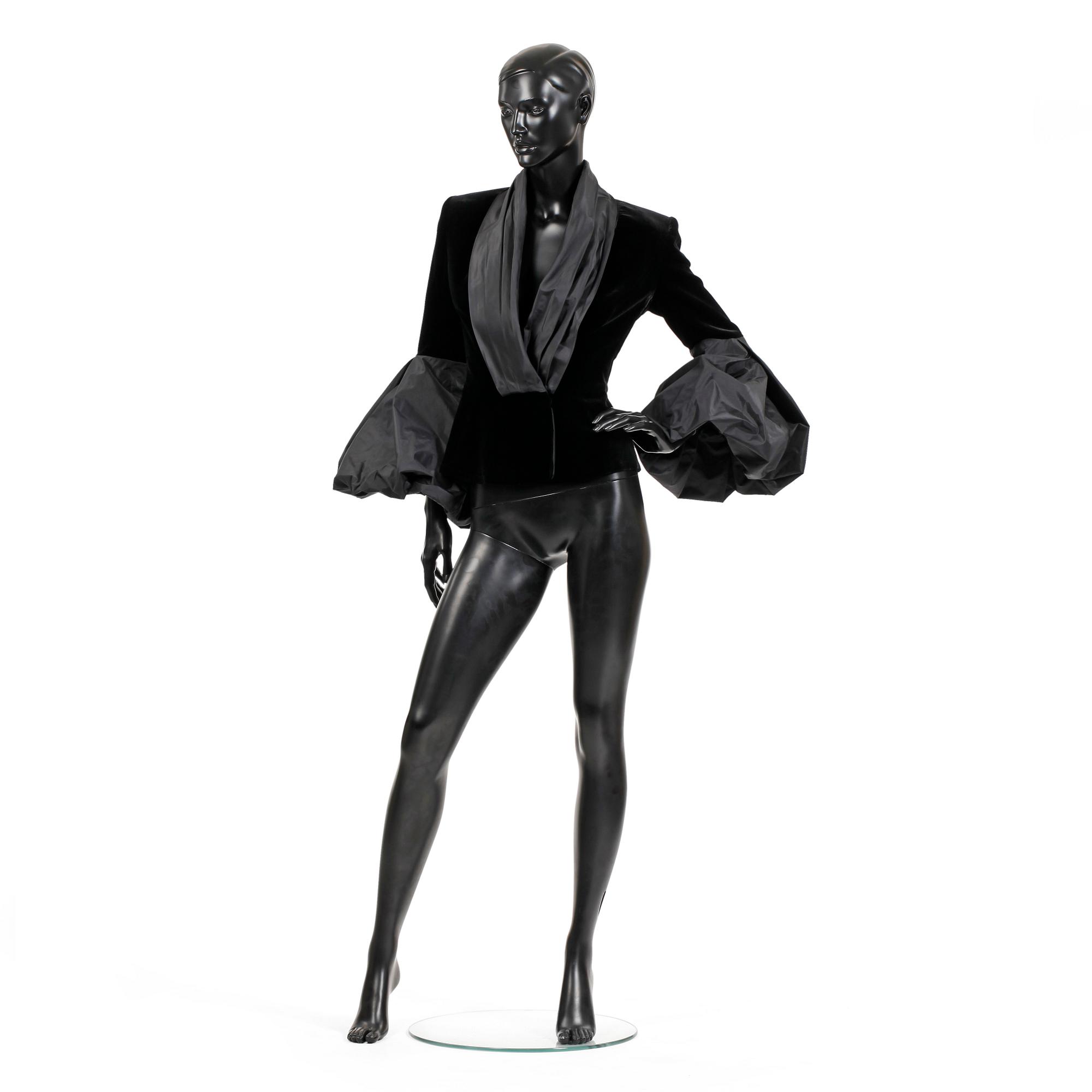 ARMANI, a black velvet evening jacket with silk details.