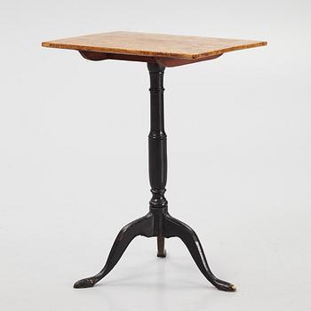 A Swedish burr-veneered tilt-top table, circa 1800.