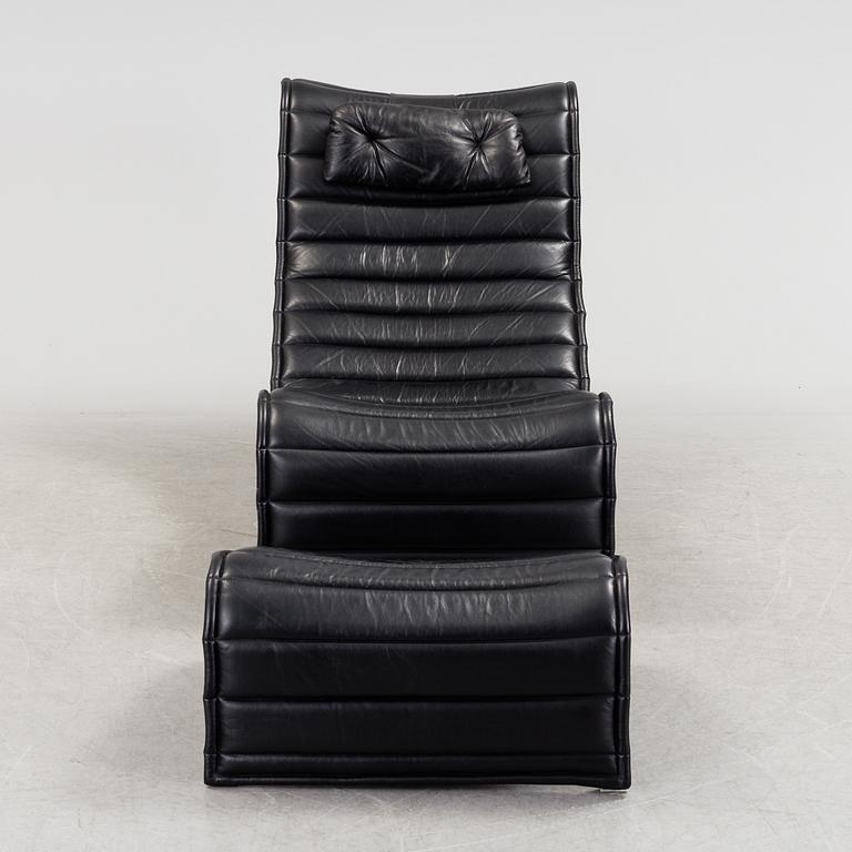 ERIC SIGFRID PERSSON, a leather upholstered lounge chair and foot stool from Möbelkultur AB.