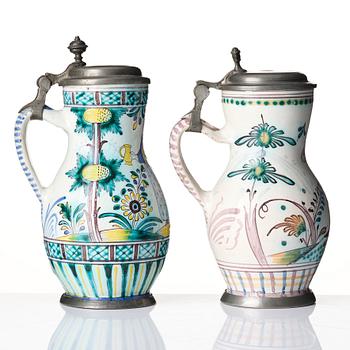 Two Dutch faience tankards with pewter lids, Delft, 18th century.