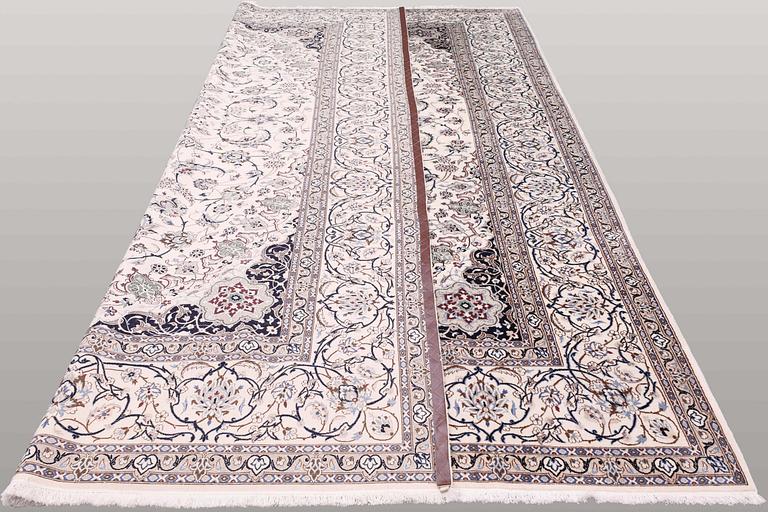 A carpet, Nain Part Silk, sk 9 LAA,  427 x 312 cm.