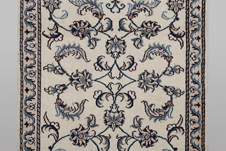 A runner carpet, Nain, part silk, ca 192 x 80 cm.