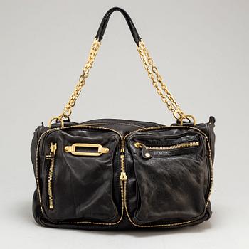 A leather bag by Jimmy Choo.