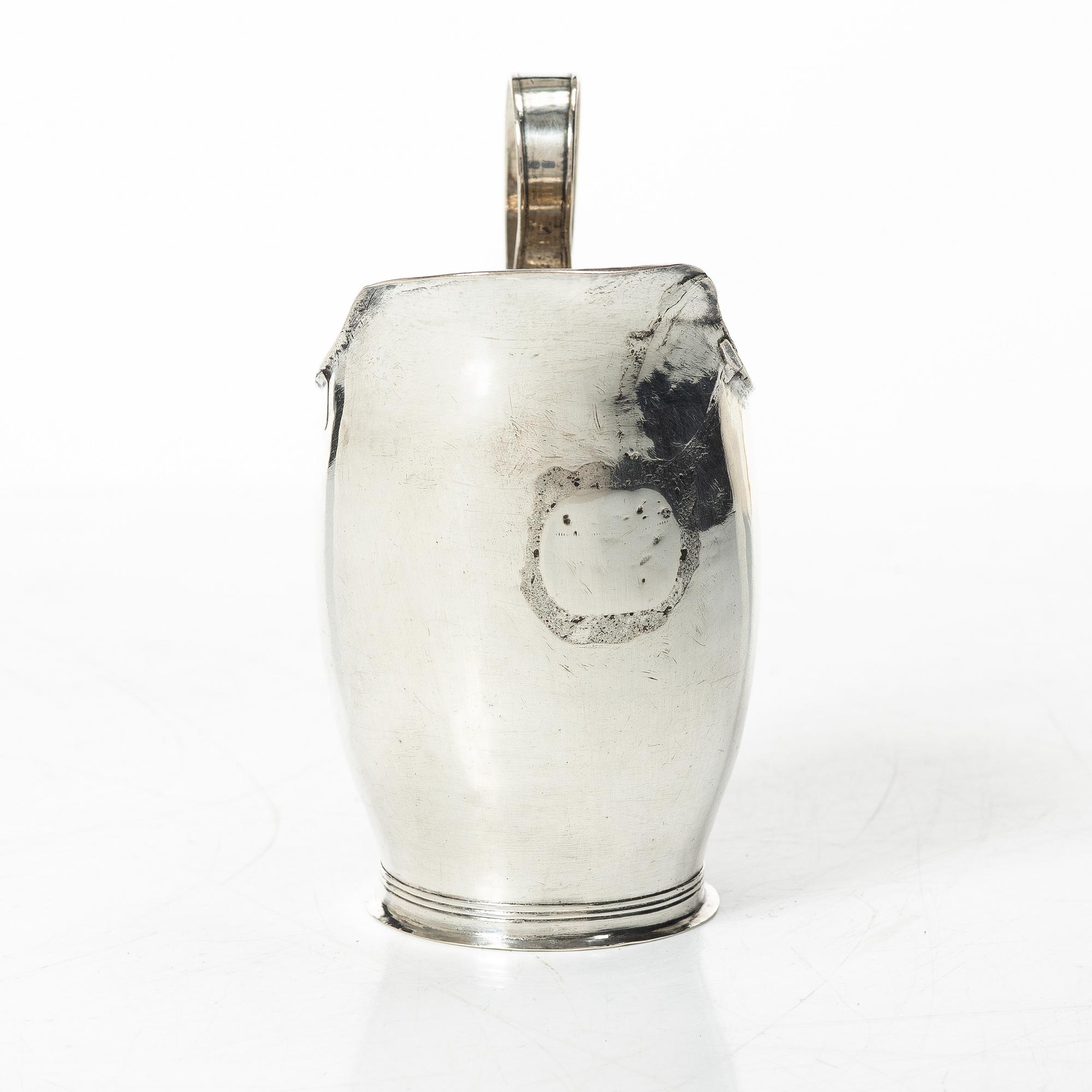 A Swedish 19th century silver creamer, mark of Nils Högrell, Stockholm 1823.