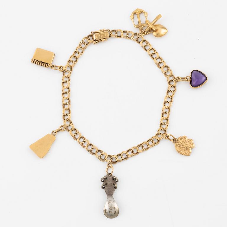 Bracelet, 18K gold, with charms.