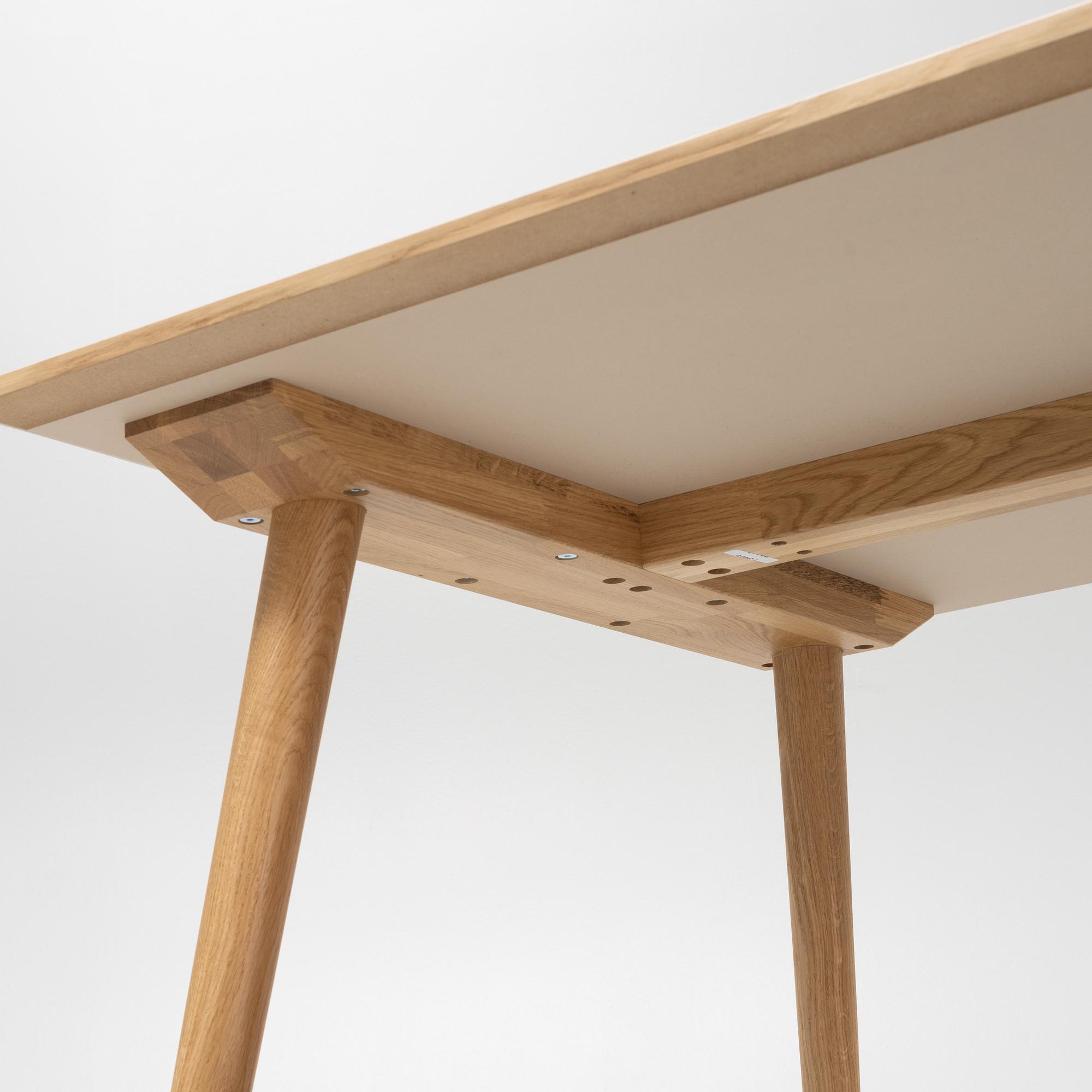 Sami Kallio, an oak veneered 'In Between' dining table from &tradition.