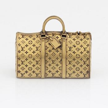 Louis Vuitton, Gold Tone Keepall Paperweight.