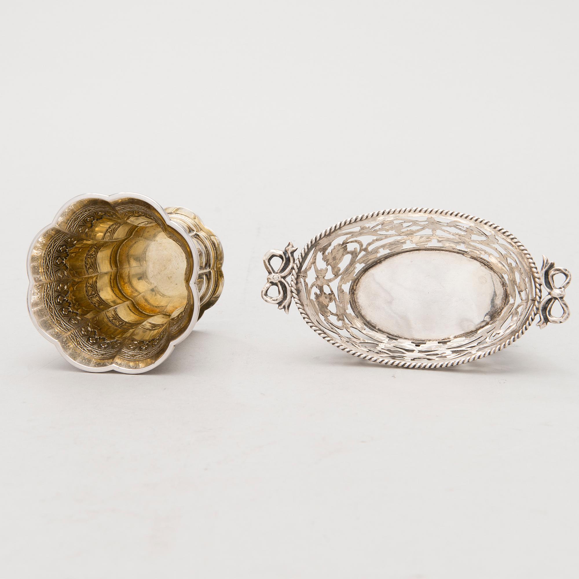 Four silver objects from the 20th Century.