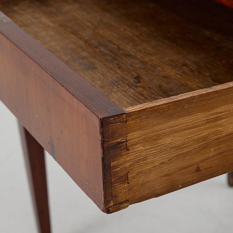 A Gustavian style writing desk, from around the year 1900.