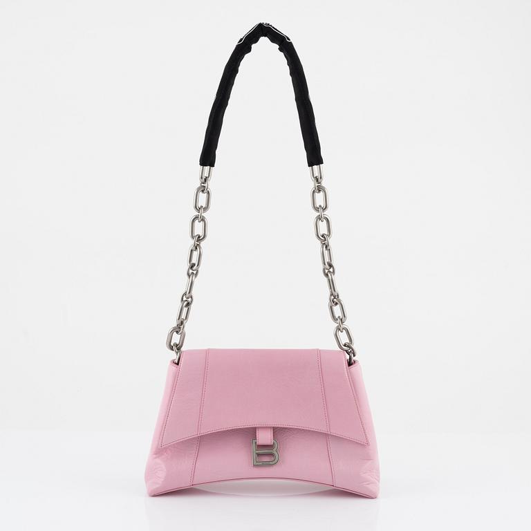 Balenciaga, a pink leather 'Downtown' bag.