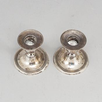 A pair of Swedish small early 19th century silver candle sticks, mark of Pehr Zethelius, Stockholm 1805.