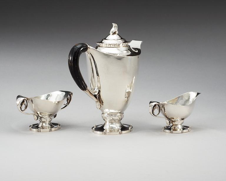 A Georg Jensen three pieces of 830/1000 silver coffee service, Copenhagen 1919-20.