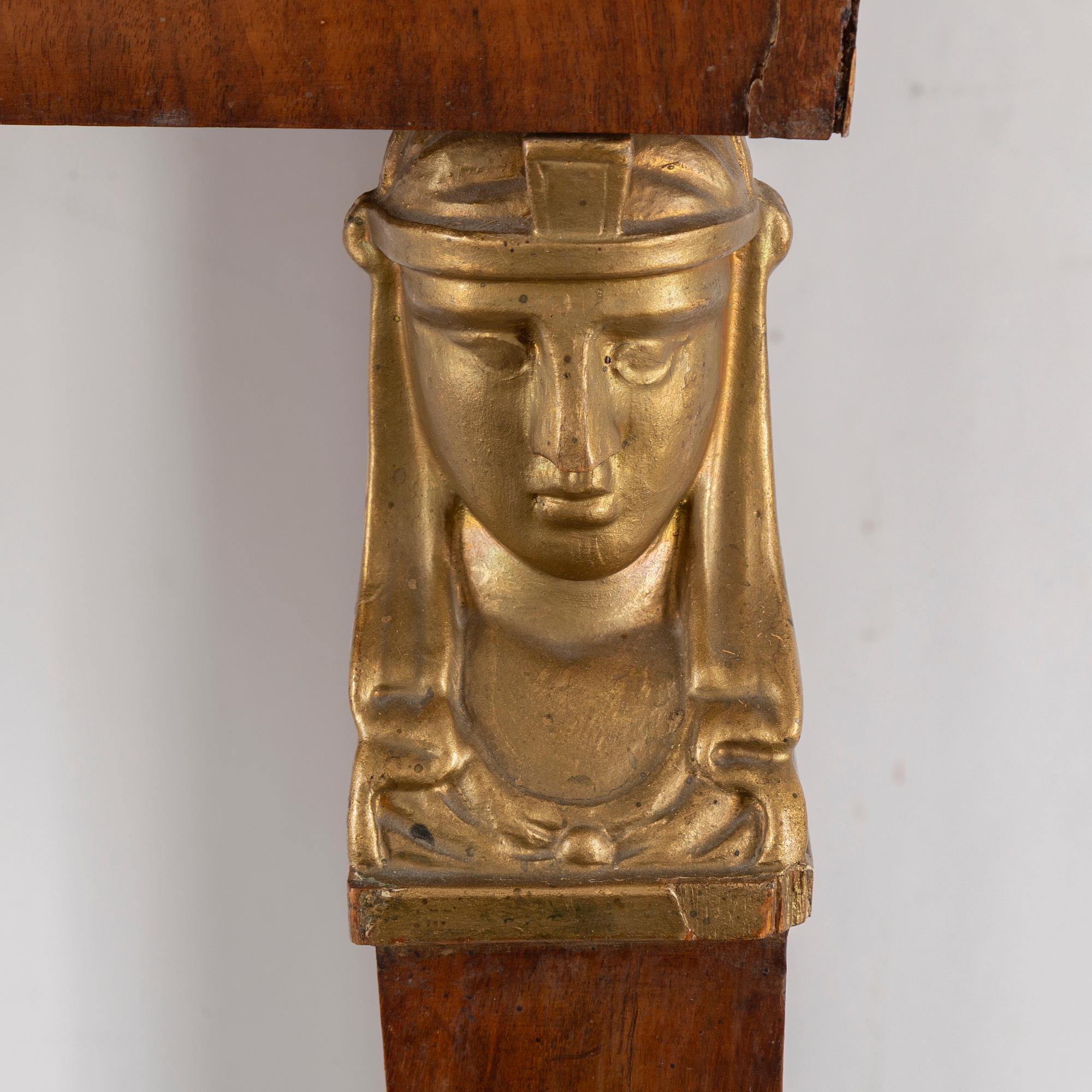 A Swedish Empire mirror and console table, first half of the 19th century.