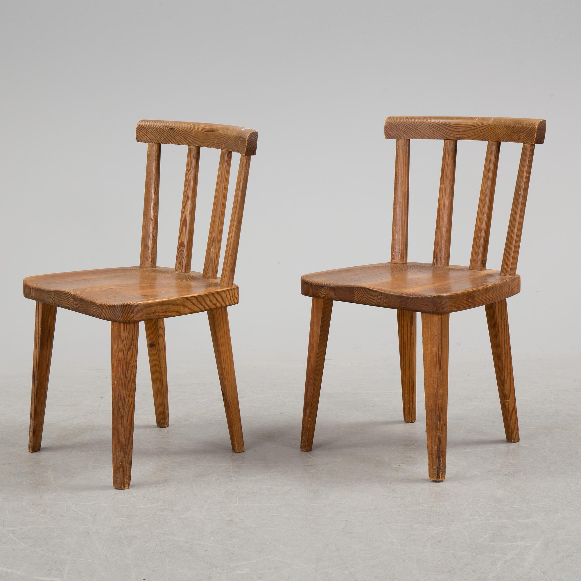 A pair of "Utö" pinewood chairs by Axel Einar Hjorth in the 1930's.