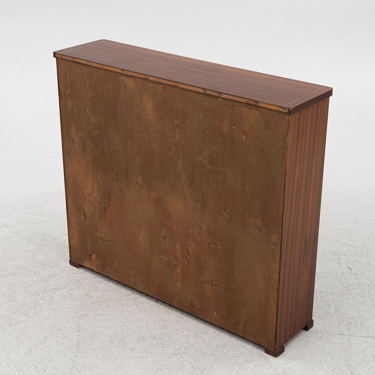 A bookcase, mid-20th Century.