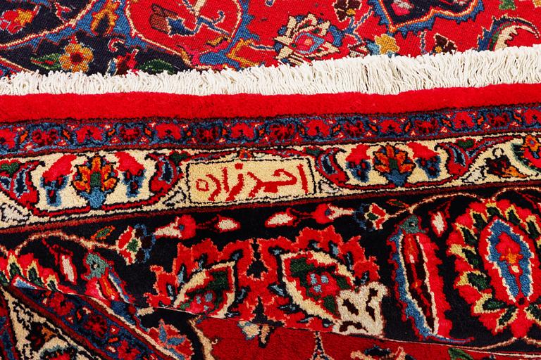 A Najafabad carpet, c. 351 X 305 cm.