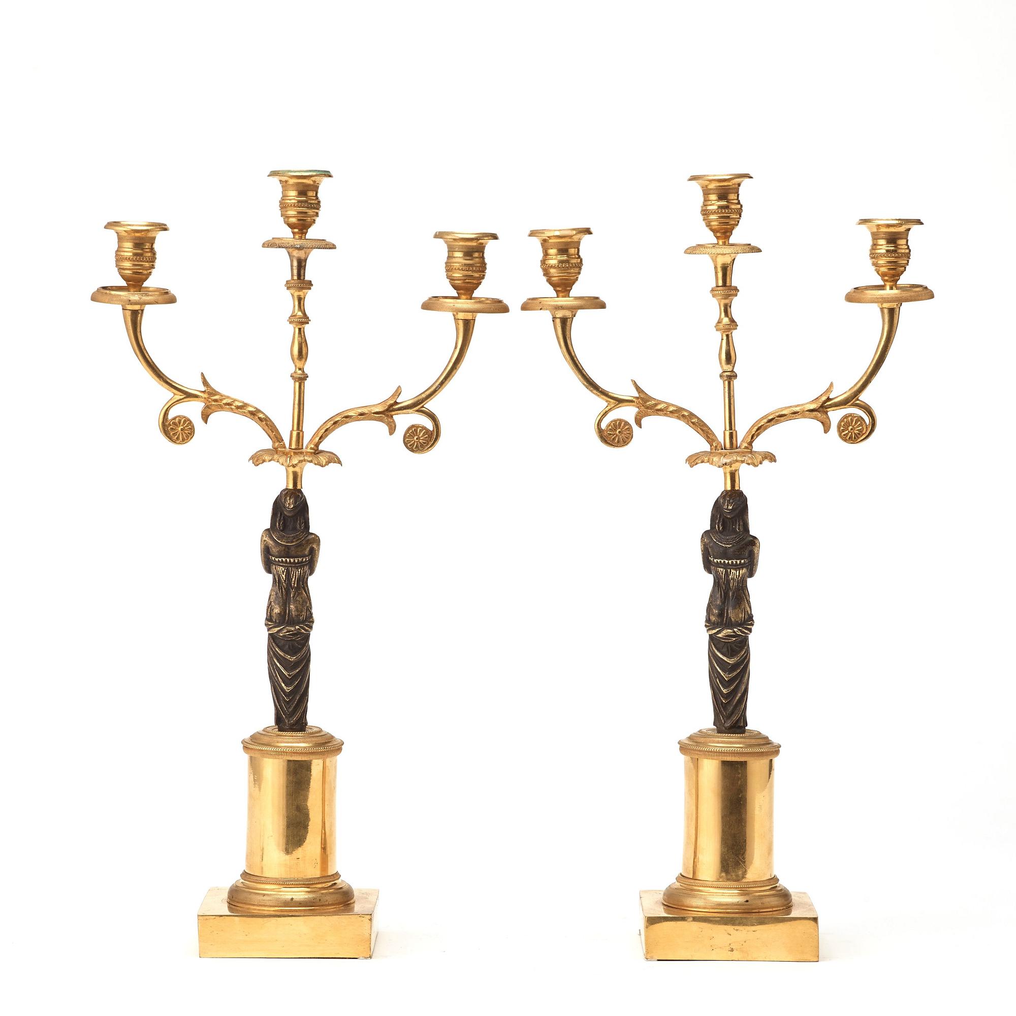 A pair of late Gustavian circa 1800 three-light candelabra.