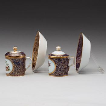 Two Berlin cups with covers and stands, circa 1800.