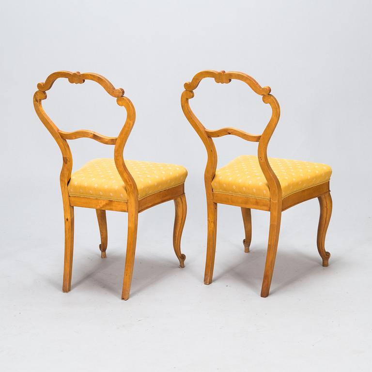 A pair of rococo revival chairs. Latter part of 19th century.