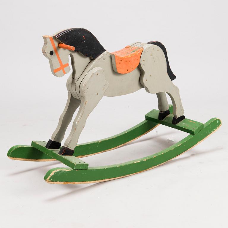 A rocking horse from the first half of the 20th Century.