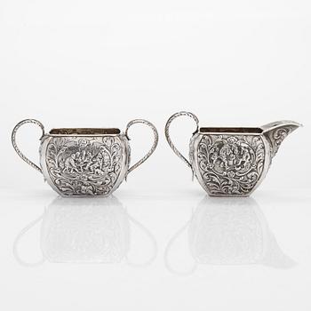 A 1940s Dutch silver sugar bowl and cream jug on a tray, Amsterdam, 1947 and 1942.