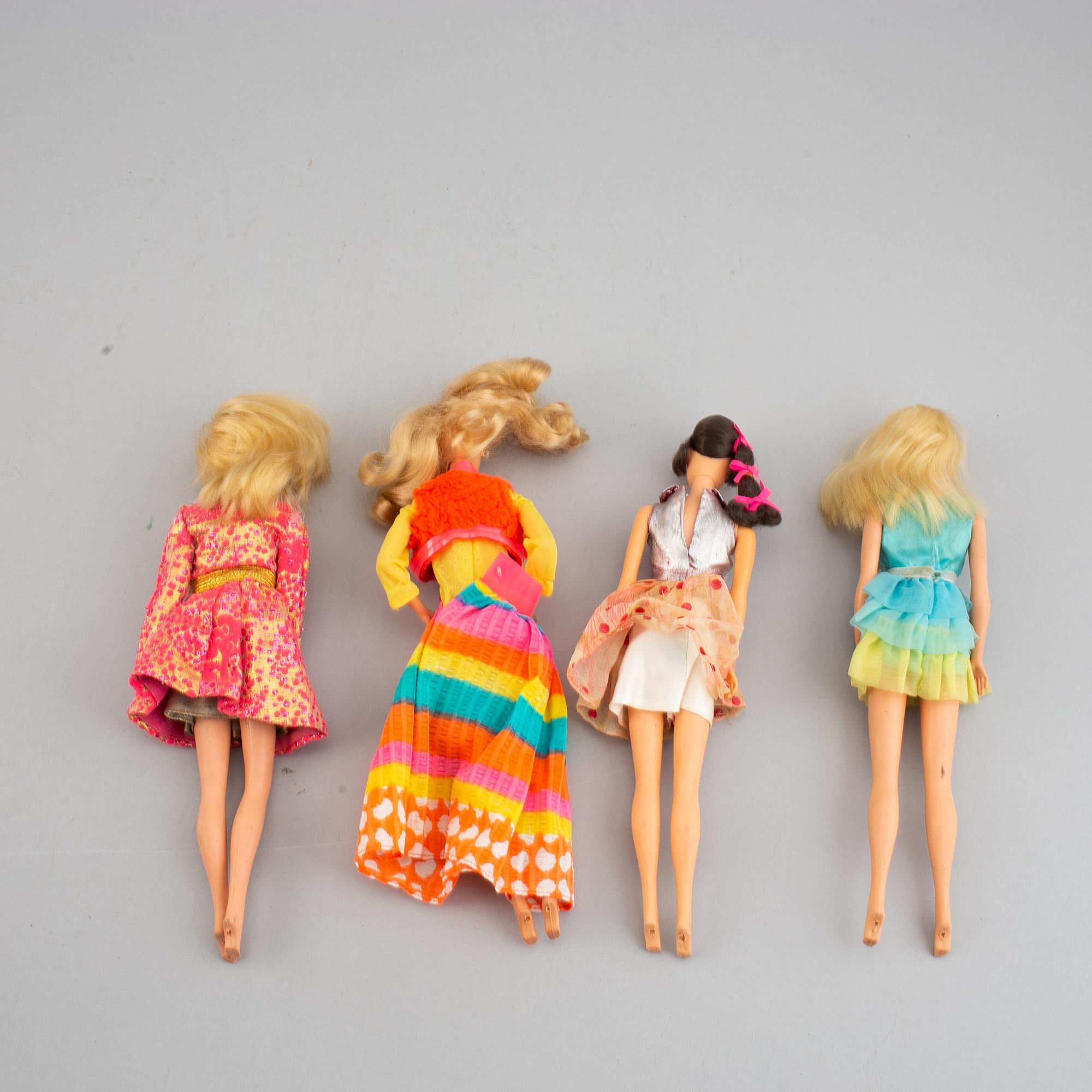 Four Barbiedolls with accessories, Mattel, 1960's-70's.