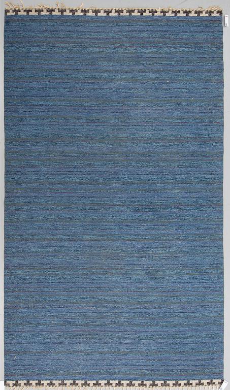 A CARPET, flat weave, atributed to Rakel Carlander, around 306 x 197 cm.