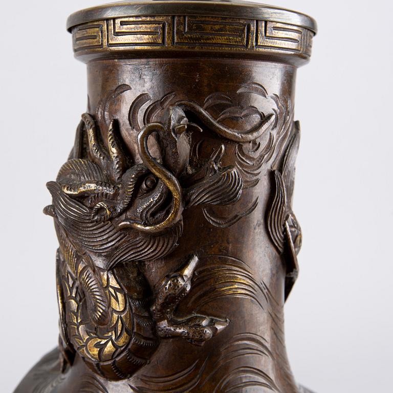 An early 1900's Japanese bronze table lamp.