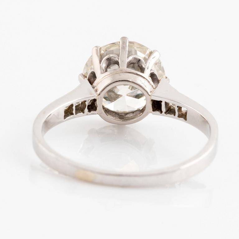 A platinum ring set with an old-cut diamond.