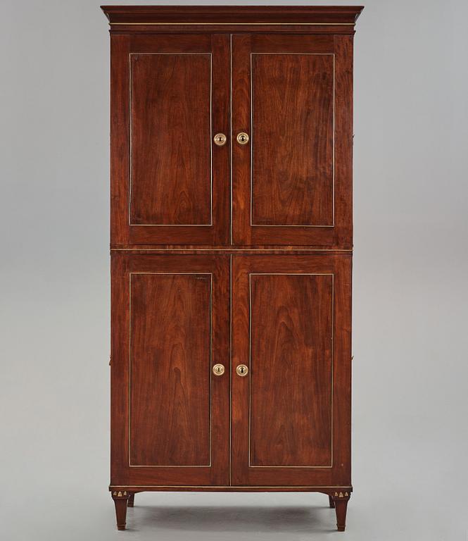 A late Gustavian mahogny cupboard.