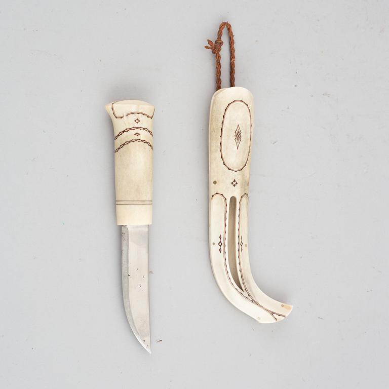 Martin Kuorak, a Sami reindeer horn knife, signed.