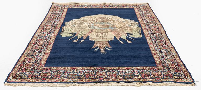 A semi-antique pictoral 'Lion and Sun' Kerman rug, c. 243 x 144 cm.