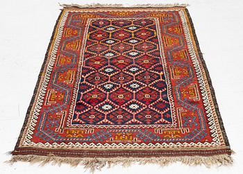 An antique Baluch rug, east Persian, ca 203 x 101 cm.