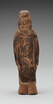 A painted pottery figure of a standing female, Tang dynasty (618-907).