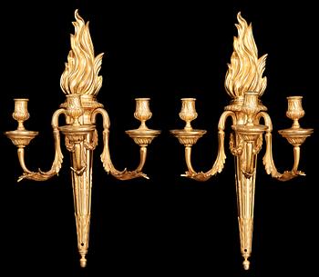 1264. A pair of Louis XVI late 18th century gilt bronze three-light wall-lights.