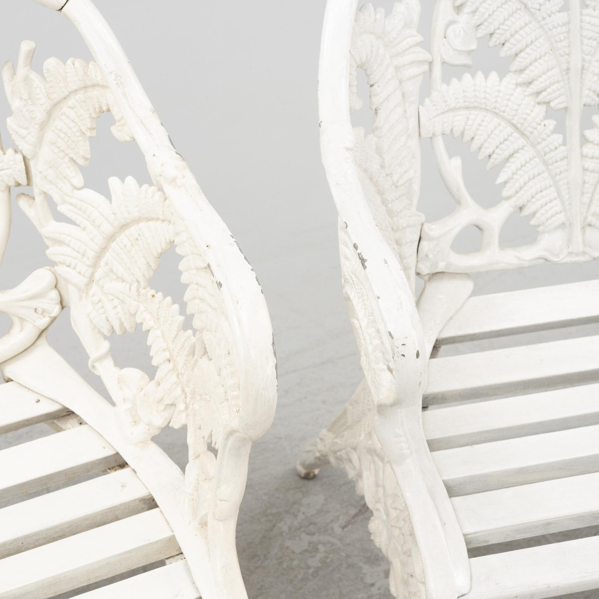 A pair of painted aluminum armchairs, second part of the 20th Century.