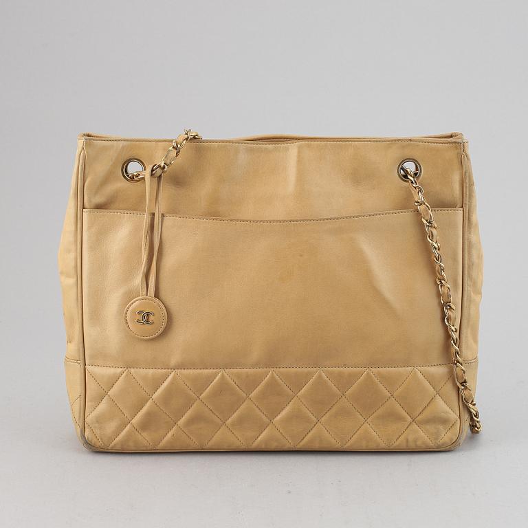 Chanel, a beige leather handbag, 1986-1988.